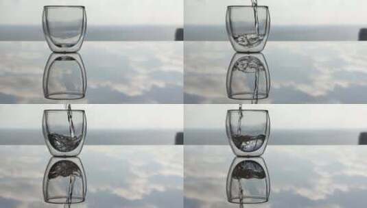 水倒进透明玻璃杯高清在线视频素材下载
