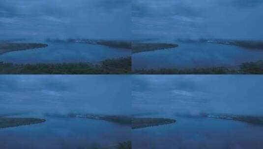 航拍原野蓝雾湖泊高清在线视频素材下载