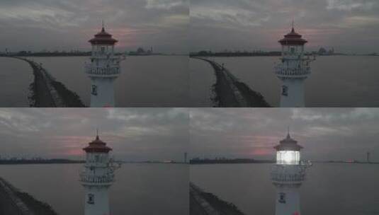 上海吴淞口夜景灯塔照亮引导货船4K航拍高清在线视频素材下载