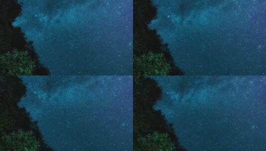 摄像机沿着树移动延时拍摄星空银河静谧夜景高清在线视频素材下载