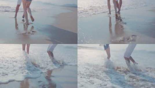 三亚旅游情侣在海边玩水嬉戏高清在线视频素材下载