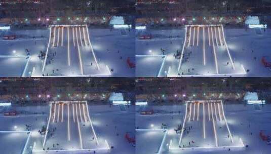 哈尔滨松花江上冬季冰雪游乐园高清在线视频素材下载
