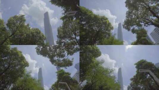 地面仰拍东塔西塔高楼绿色城市高清在线视频素材下载