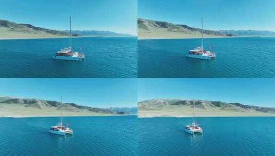 航拍湖面上行驶的帆船高清在线视频素材下载