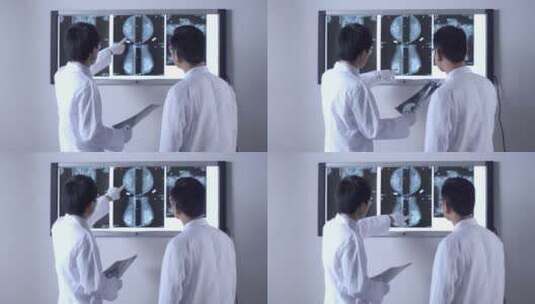4K医生看CT光片结果诊断讨论高清在线视频素材下载