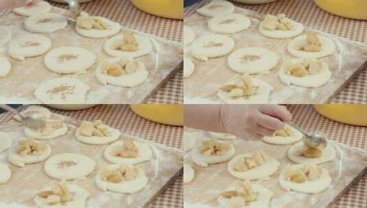 烹饪和家庭概念女性手特写将苹果果酱放在面团圈上烘烤高清在线视频素材下载