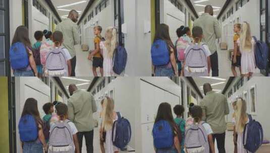 非裔美国男教师和不同学生在学校大厅散步的背影视频高清在线视频素材下载