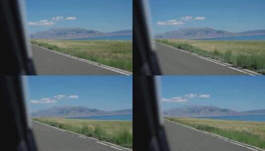 新疆赛里木湖边行驶的车辆高清在线视频素材下载