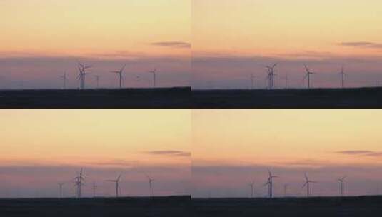 夕阳下风能风力发电厂风车高清在线视频素材下载