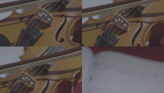 小提琴琴弦上的缠丝特写高清在线视频素材下载