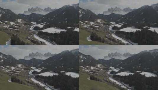 意大利瓦尔迪富内斯白雪覆盖的村庄鸟瞰图。高清在线视频素材下载