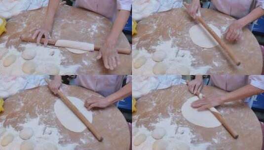 使用传统技术用擀面杖手工制作扁平面包高清在线视频素材下载