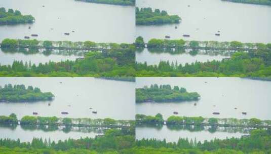 江南杭州西湖苏堤旅游湖面上的观光船高清在线视频素材下载