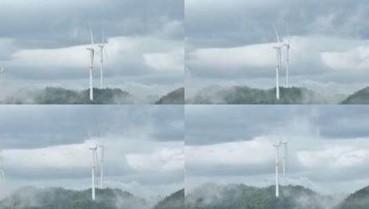航拍山顶清洁能源运行的风力发电机风车高清在线视频素材下载