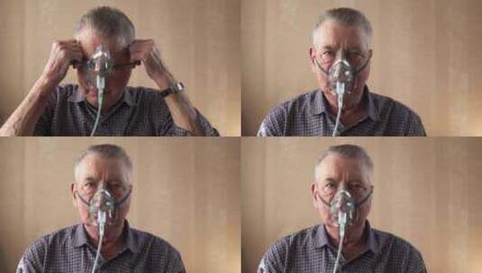 老人戴上呼吸面罩，做了几次深呼吸高清在线视频素材下载