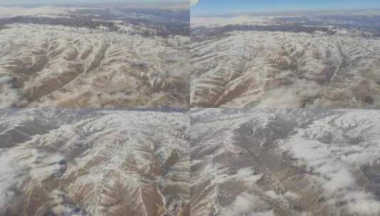 飞机窗外看西北贫瘠苍茫的土地和雪景高清在线视频素材下载