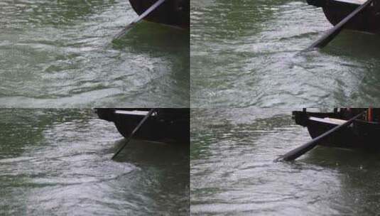 （慢镜）江南古镇摇橹船雨天划桨桨叶特写高清在线视频素材下载