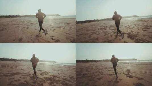 在沙滩慢跑的男人高清在线视频素材下载