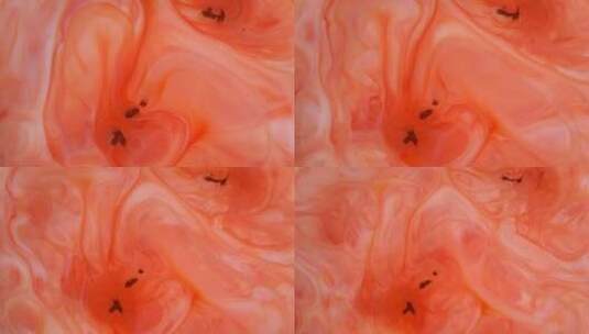 红色和橙色墨水在水中扩散高清在线视频素材下载