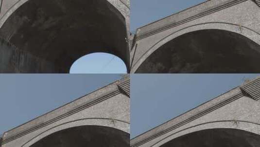 公路上桥梁拱门的倾斜镜头高清在线视频素材下载