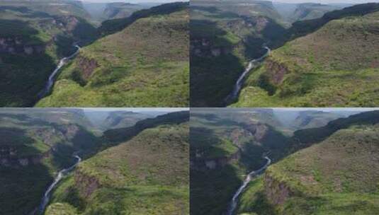 飞越植被覆盖的大峡谷高清在线视频素材下载