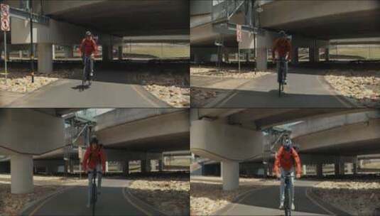 道路上骑自行车的男人高清在线视频素材下载
