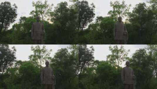5k上海宝山行知公园陶行知雕像黄昏逆光拍摄高清在线视频素材下载