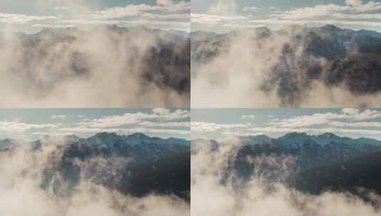 雪山山顶云雾涌动登高望远冬季森林高清在线视频素材下载