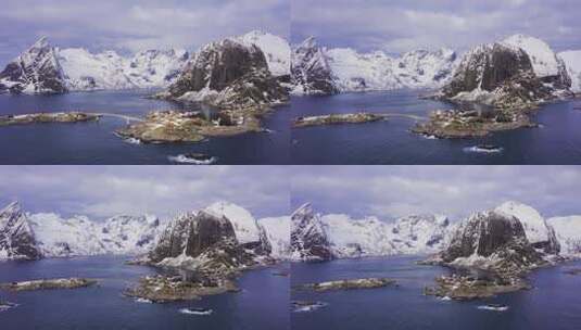 冬天的汉努瓦村和山脉。挪威罗弗敦群岛。鸟瞰图高清在线视频素材下载