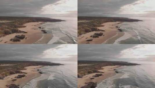 葡萄牙大西洋海岸线上遥远的金色沙滩；空中撤退高清在线视频素材下载