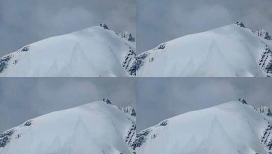 登山者攀登四川甘孜贡嘎山乡乌库楚雪山高清在线视频素材下载