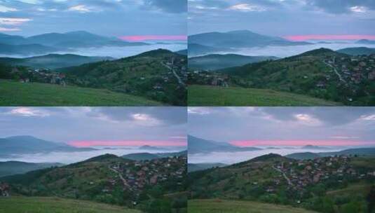 山坡上的日出景色和晨雾和一个小村庄高清在线视频素材下载