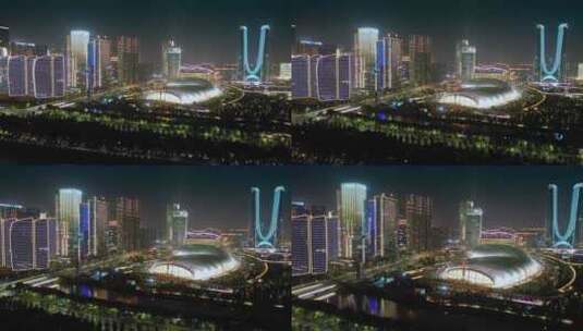 航拍杭州奥体中心建筑夜景高清在线视频素材下载