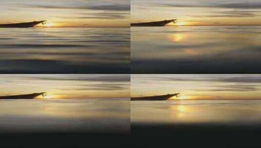 背景为日落的船的水面照片高清在线视频素材下载