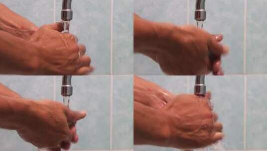 用肥皂和自来水洗手的人高清在线视频素材下载