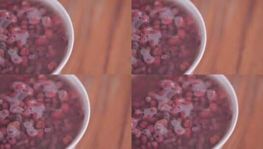 实木桌子上放祛湿红豆粥 (4)高清在线视频素材下载