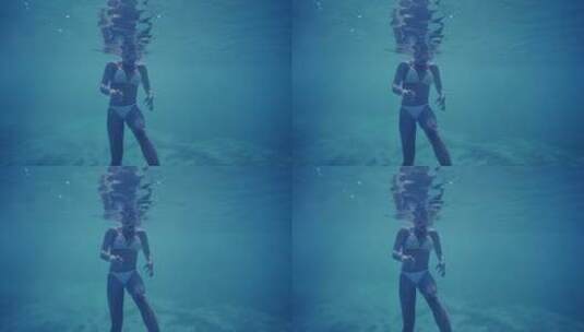 女人穿比基尼在海里浮潜高清在线视频素材下载