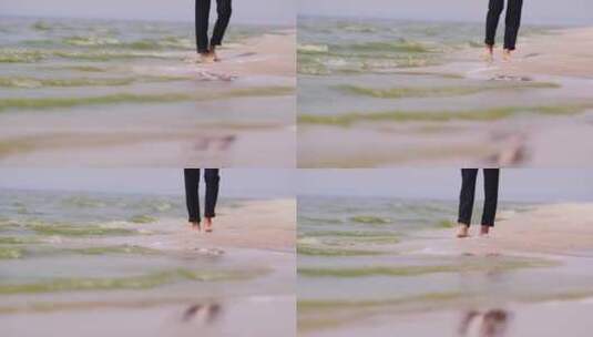 赤脚在海滩散步的人高清在线视频素材下载