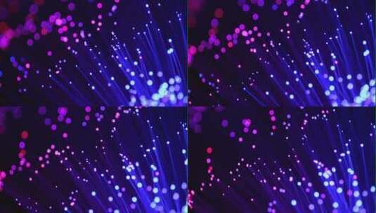 用蓝色和粉红色光照亮的光纤管的尖端高清在线视频素材下载