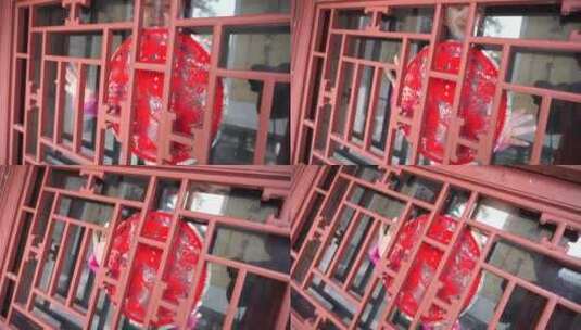 中式四合院胡同女人在贴窗花高清在线视频素材下载
