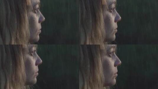 在雨中淋雨的女人肖像高清在线视频素材下载