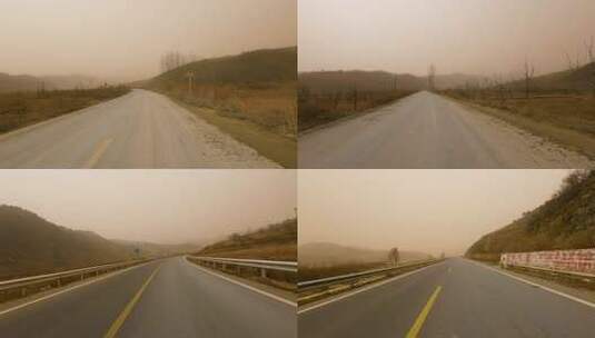 扬沙天气自驾农村在公路上高清在线视频素材下载