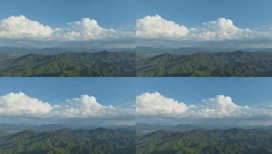 森林航拍山峰云朵山脉原始森林蓝天白云风景高清在线视频素材下载