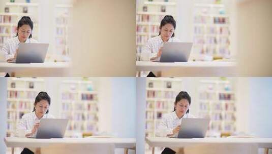 职业女性在办公室内笔记本电脑上工作高清在线视频素材下载