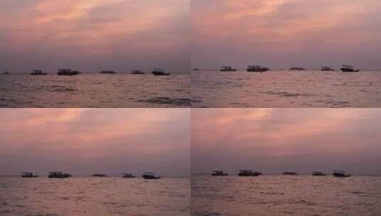 海上彩霞中漂泊的船高清在线视频素材下载