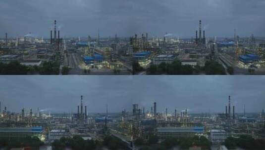 石油化工企业夜幕降临时刻的炼油厂平移航拍高清在线视频素材下载