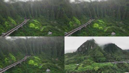 FPV穿越机航拍夏威夷汽车公路隧道森林高山高清在线视频素材下载