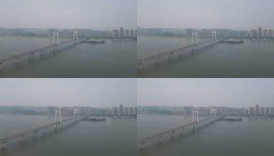 航拍长沙湘江岸边三汊矶大桥高清在线视频素材下载