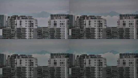 雪山下的城市云雾山峰建筑高清在线视频素材下载