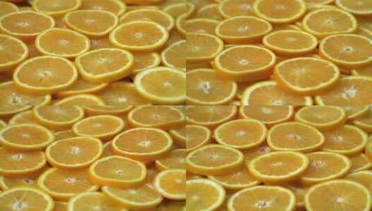4K-新鲜橙子柑橘切片、橙子水果旋转视频高清在线视频素材下载